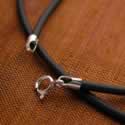 Rubber necklace with silver findings.