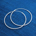 Silver hoop earring image